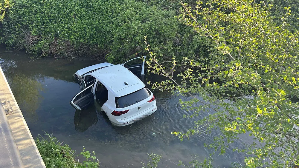 Young Driver Escapes Unscathed After Car Plunges into Surb River