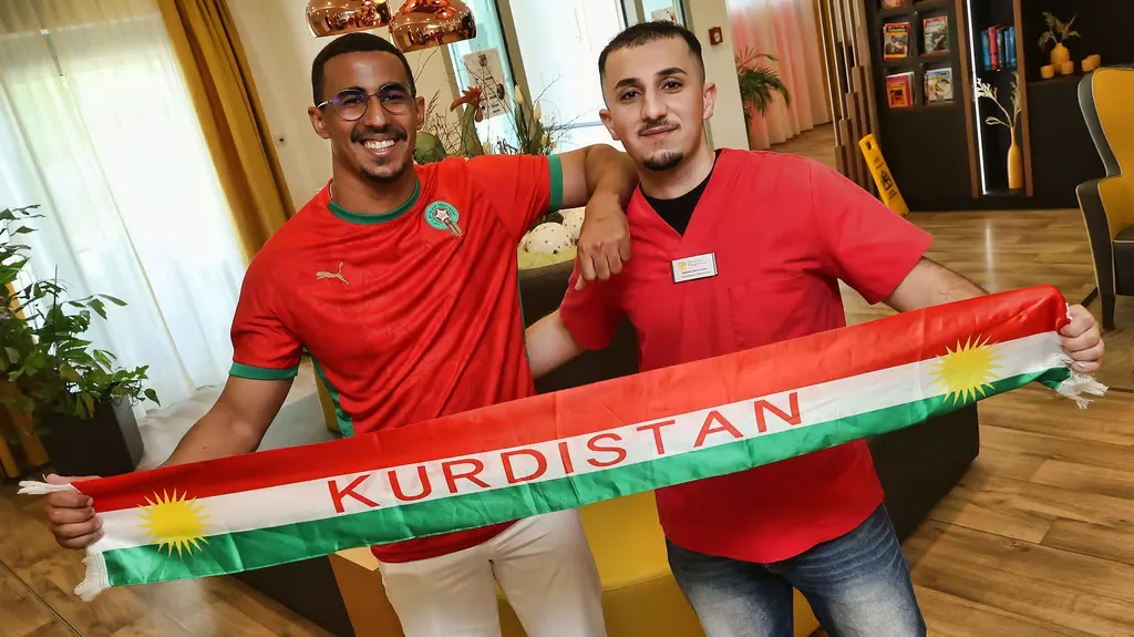 Hope and Passion: Moroccan and Iraqi Caregivers Share World Cup Aspirations