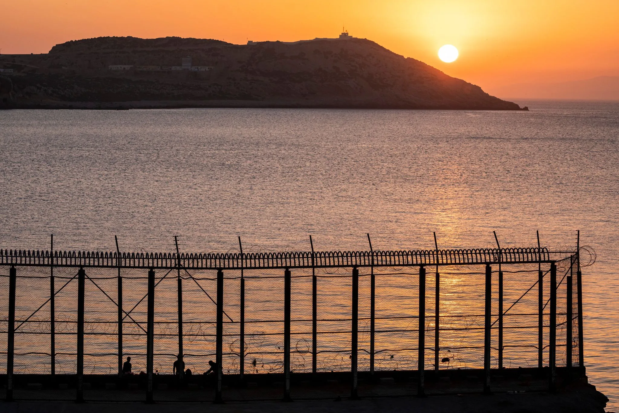 Surge in Migrant Swimmers Overwhelms Ceuta's Border Security