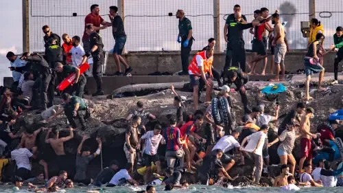 Mass Migration: Thousands of Migrants Enter Spain's Ceuta Enclave from Morocco