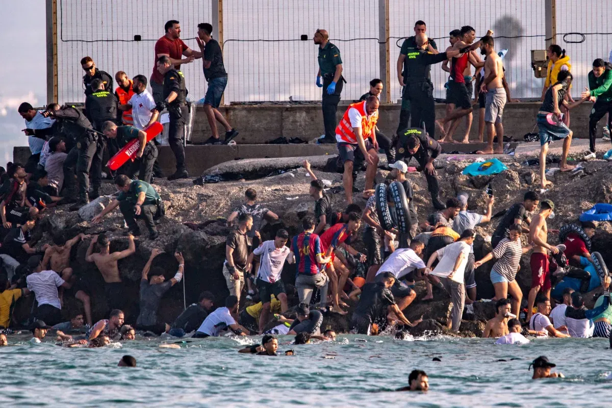 Thousands of Migrants Cross Borders Between Morocco and Ceuta