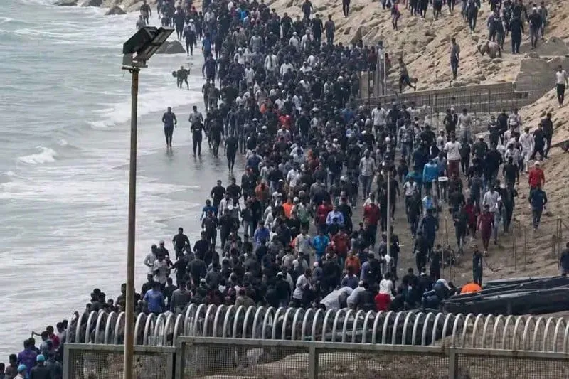Mass Exodus from Morocco: Thousands Flee to Ceuta Amid Economic Hardship