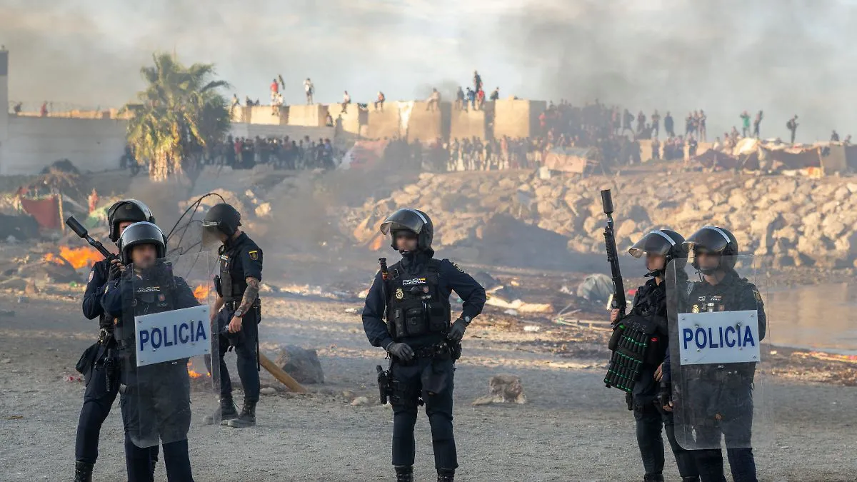 Ceuta's Migrant Crisis: Spain Seeks EU Support Amid Local Tensions