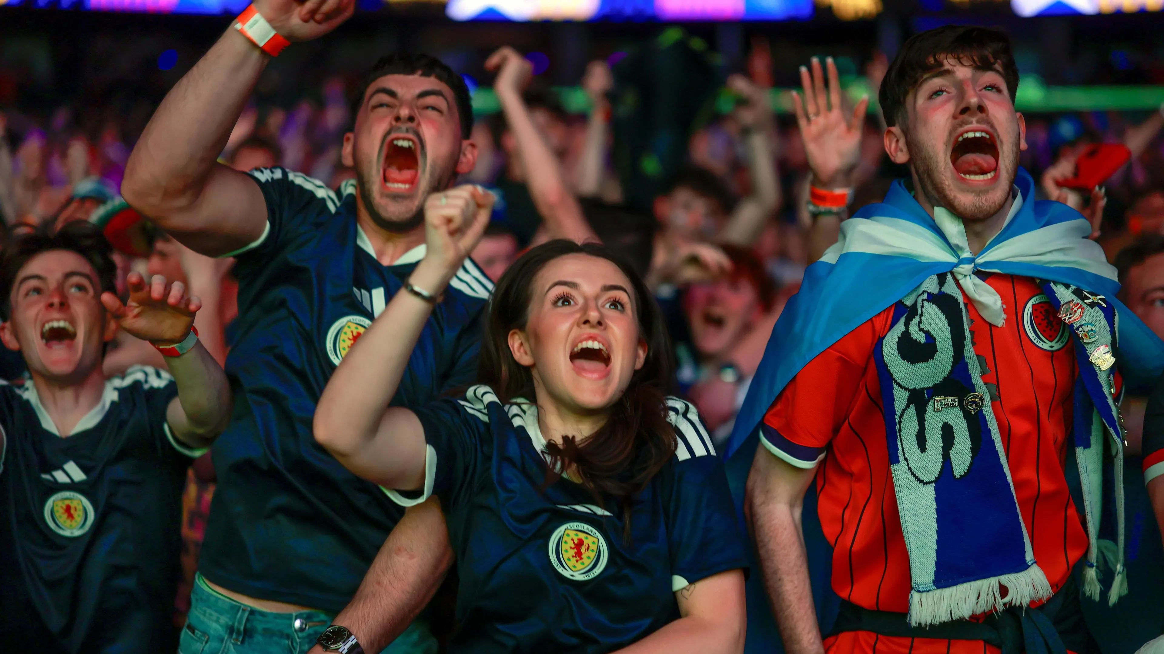 Celebrating Unity: Scotland Fans Join Moroccan Supporters in Joyful Chant